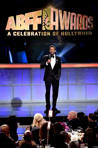 Taking the Stage - Host Mike Epps keeps the crowd in a fit of laughing tears as he cracks a few jokes onstage during the 2016 ABFF Awards: A Celebration Of Hollywood. (Photo: Alberto Rodriguez/BET/Getty Images for BET)