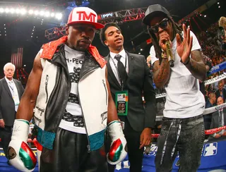Theme Music - Lil Wayne&nbsp;provides the soundtrack for&nbsp;Floyd "Money" Mayweather Jr. as he enters the ring to fight Marcos Maidana at the MGM Grand Garden Arena in Las Vegas.(Photo: Ed Mulholland/Golden Boy/Golden Boy via Getty Images)