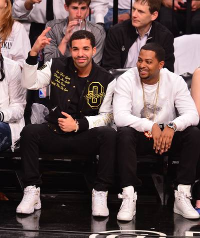 B-Ball Lover - Drake&nbsp;is a happy fan sitting courtside at the Toronto Raptors vs. Brooklyn Nets game at Barclays Center in the borough of Brooklyn, New York City. (Photo: James Devaney/GC Images)