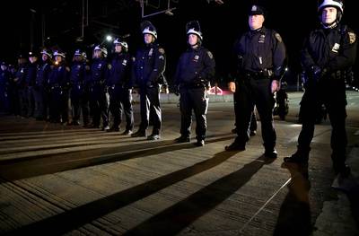 To the Highway? - Police officers block protesters from marching up a highway entrance ramp in New York.&nbsp;(Photo: AP Photo/Seth Wenig)