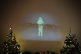 It Can See You! - An interactive installation that visualizes visitors in a snowscape projected on the wall with live movement is seen at the East Garden Room.  (Photo: Alex Wong/Getty Images)