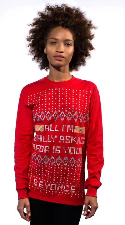 Shop New Holiday Beyoncé Apparel - Ever since the release of &quot;7/11&quot;, we were wondering when&nbsp;Beyoncé&nbsp;was going to release new gear for the holidays in honor of the video. Well, now you can cop her Ugly Holiday Ski Lodge shirt&nbsp;in a festive red color with &quot;Mine&quot; lyrics, &quot;All I'm really asking for is you&quot;. Check it out at&nbsp;Beyonce.com.&nbsp;(Photo: shop.beyonce.com)