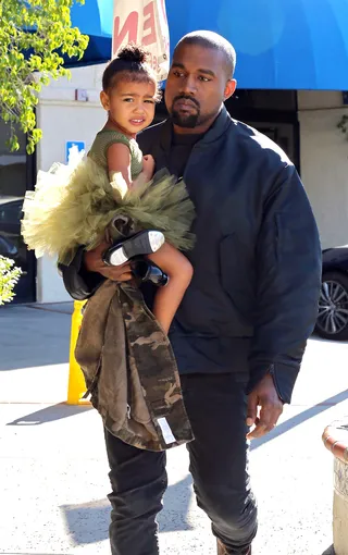 Kanye&nbsp;and North West - Kanye has been killing it on daddy duty. The rapper is often spotted taking his little girl to ballet class. Side note: how fly are Nori’s mini camo jacket and matching green tutu? (Photo: PacificCoastNews)