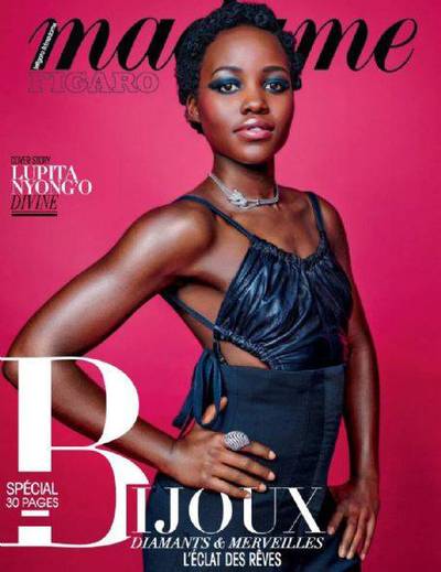 Lupita Nyong’o on Madame Figaro - The Star Wars: The Force Awakens beauty shows off her fit arms in a silky navy drawstring top and skirt combo, adding intense smoky eyes and sweet pink lips. She’s gone to the dark side...and we love it!(Photo: Madame Figaro Magazine)