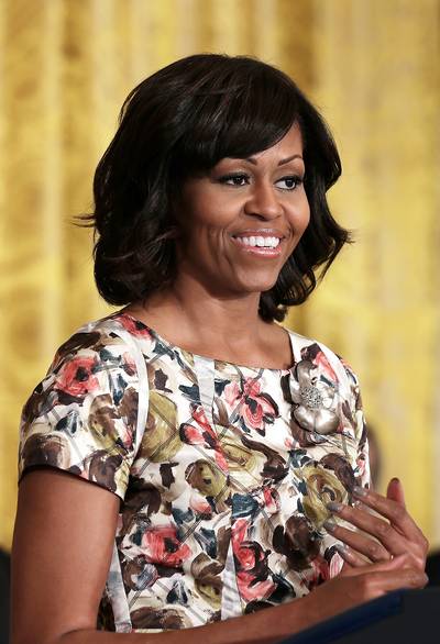 Back on the Trail - First Lady Michelle Obama is hitting the campaign trail this month to support Massachusetts senatorial candidate Rep. Ed Markey. She will attend a fundraiser in Boston, for which tickets cost up to $37,600, the Boston Globe reports.  (Photo: Alex Wong/Getty Images)