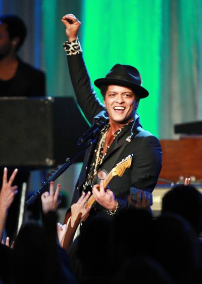 Best R&amp;B/Soul Male Artist: Bruno Mars - Bruno Mars continued his musical winning streak with an eclectic mix of retro-influenced R&amp;B, pop and dance hits. (Photo: Joe Scarnici/Getty Images for EIF)