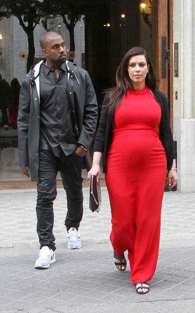 KimYe's Wedding Date? - Now we don't have an exact date, but rumor has it that once Kim Kardashian and Kanye West have their first child, a starlit wedding will go down. This scenario looks more and more like Amber Rose and Wiz Khalifa's on the daily. Either way, congrats to the couple!   (Photo: KCS Presse / Splash News)