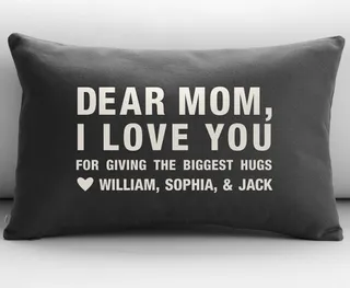 Personalized Dear Mom Throw Pillow Cover - Show her how you really feel with this customized pillow. Just fill in the blank with your name and a personalized message.   (Photo: Courtesy Red Envelope)
