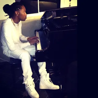 Future @1freebandz - Who would of thought that Future could play classical piano? The ATL rapper keeps it classy in an all white ensemble.&nbsp;(Photo: Future via Instagram)