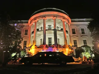 Trick or Treat! - The South Portico of the White House was decorated and lit in orange lights for Halloween. President Obama and First Lady Michelle Obama welcomed local children and children of military families to enjoy the &quot;scariest&quot; day of the year. — Joyce Jones  (Photo: AP Photo/Pablo Martinez Monsivais)