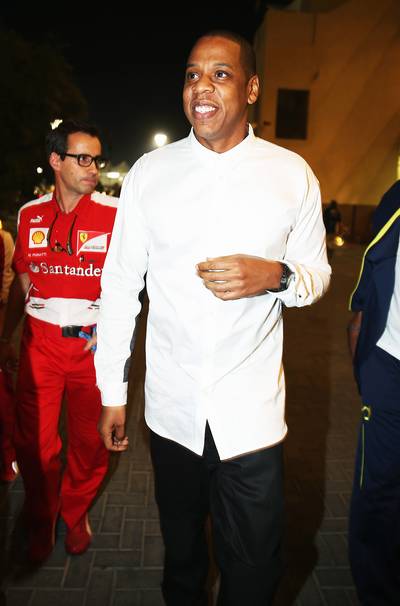 Lifestyles of the Rich and Famous - Jay-Z arrives in the F1 paddock following practice for the Abu Dhabi Formula One Grand Prix at the Yas Marina Circuit in Abu Dhabi, United Arab Emirates. (Photo: Mark Thompson/Getty Images)