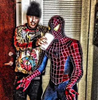 French Montana @frenchmontana - French Montana gets into the Halloween spirit and kicks it with Spider-Man over a drink.(Photo: French Montana via Instagram)