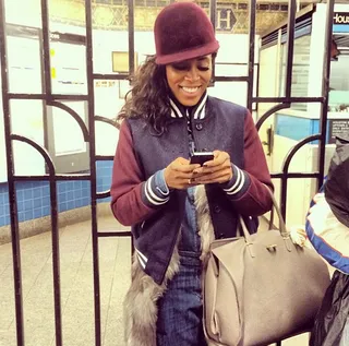 June Ambrose  - The celeb stylist’s letterman jacket gives a sporty edge to her denim overalls and fur vest tucked underneath. What’s not to love?&nbsp;   (Photo: June Ambrose via Instagram)