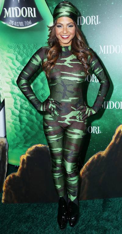 Camo Girl - Christina Milian rocks green camouflage from head to toe at the 3rd annual Midori Green Halloween party held at Bootsy Bellows nightclub in Los Angeles.&nbsp;(Photo: Guillermo Proano/WENN.com)