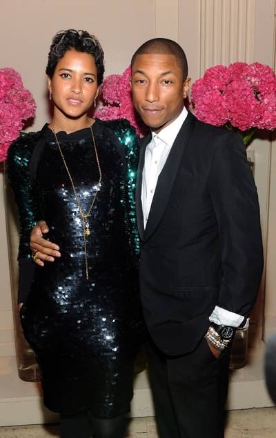 His Better Half - Pharrell Williams attends Gabrielle's Angel Foundation's 2013 Angel Ball with his wife, Helen Lasichanh, at Cipriani Wall Street in New York City. (Photo: Jamie McCarthy/Getty Images for Gabrielle's Angel Foundation)
