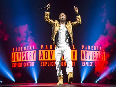 Hometown Hero - Kendrick Lamar hits the stage as the opening act for Kanye West's Yeezus tour in Los Angeles. Lamar, who was born and raised in L.A., received a grand reception at the Staples Center. (Photo: Christopher Polk/Getty Images for AEG)