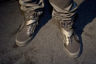 Yo Gotti - black&nbsp;Giuseppe Zanotti Paneled High Top - Yo Gotti was going for a more sophisticated look and decided upon these particular Giuseppe Zanotti's. He noted that it was the swoop on the shoe that made him interested.  (Photo: Paras Griffin/BET/Getty Images for BET Networks)