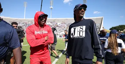 JacksonsthomecomingCoach Prime and Snoop Dogg at HC game.jpg