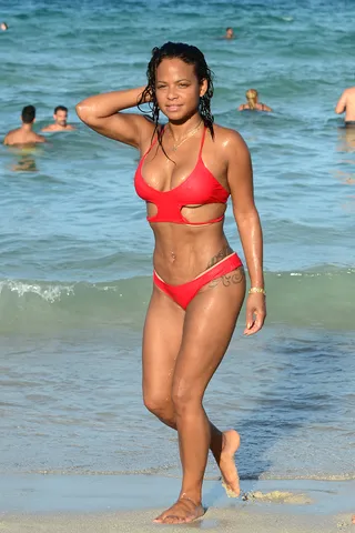 Christina Milian - Christina Milian showed off her incredible figure while enjoying the sunshine with friends at Miami Beach. (Photo: Thibault Monnier/LCD, PacificCoastNews)