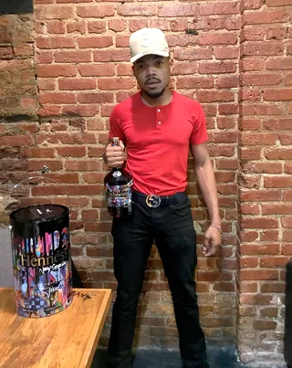 Chance the Rapper - Chance the Rapper held his Hennessy V.S Limited Edition by JonOne deluxe edition backstage at Bottom Lounge in Chicago. (Photo: Daleesia Underwood)