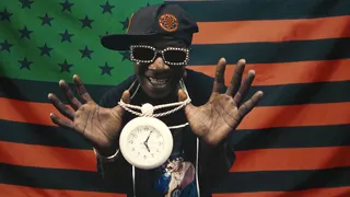 Flavor Flav pulled out one of his signature clock medallions to perform at the 2020 BET Awards. - (Photo: BET) (Photo: BET)