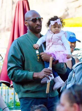 Kobe&nbsp;and Bianka Bryant - The baller's youngest daughter, Bianka, just turned 1-years-old. So, naturally, he took her and the rest of the family to the happiest place on earth to celebrate: Disney! (Photo: Splash news)