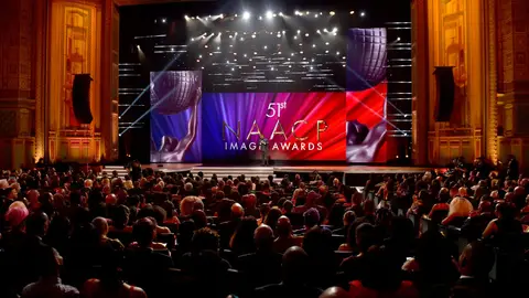 PASADENA, CALIFORNIA - FEBRUARY 22: Anthony Anderson speaks onstage during the 51st NAACP Image Awards, Presented by BET, at Pasadena Civic Auditorium on February 22, 2020 in Pasadena, California. (Photo by Aaron J. Thornton/Getty Images for BET)