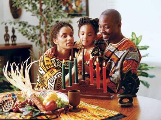 Celebrating Kwanzaa - Thousands of Blacks across America are celebrating Kwanzaa. It began on Friday and will continue through Jan. 1 with public and private candle-lighting ceremonies, African-inspired performances and ancestral tributes. The holiday promotes values that reflect success and progress in Black America's history.