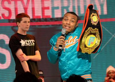 Here It Is - Rapper Bow Wow (C) holds up a belt after mediating a freestyle contest on BET's 106 &amp; Park on March 22, 2013 in New York City. (Photo: Mike Coppola/Getty Images for BET)