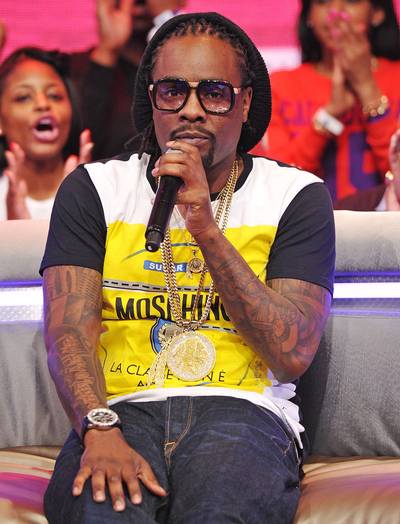 Wale, @Wale - Tweet: &quot;That LRT was so stupid it was genius. There was a so much wrong with it. That it was perfect.&quot;Wale explains why he'd RT a threat/request to rep proper on the Summer Jam XX stage ? with a set featuring Backyard Band and Fattrell.(Photo: Mike Coppola/Getty Images for BET)