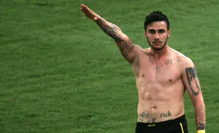 Banned - AEK Athens midfielder Giorgos Katidis was banned for life from the Greek national football team after he celebrated scoring a goal with a Nazi salute. The team said the gesture &quot;is a deep insult to all victims of Nazi brutality.&quot; (Photo: AP Photo/INTIME)