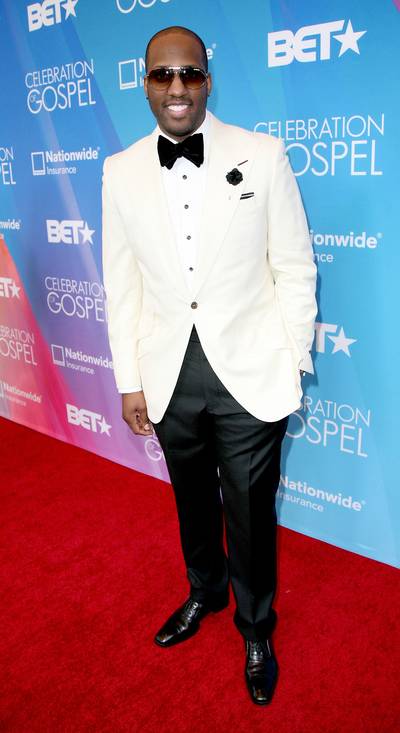 Simplicity Is The Key - Like Tye Tribbett, Isaac Carree decided to take the red carpet by storm in a simple black and white ensemble.(Photo: Maury Phillips/Getty Images for BET)