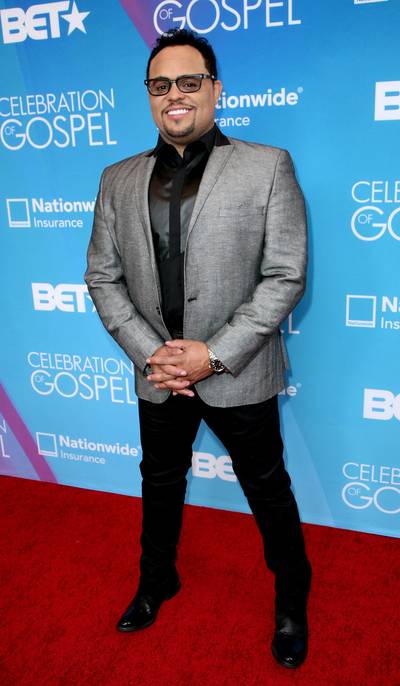All Black Everything... Almost - Singer Israel Houghton dresses up his all black ensemble with leather embellishment, patent leather shoes and a grey blazer with black collar.  (Photo: Maury Phillips/Getty Images for BET)