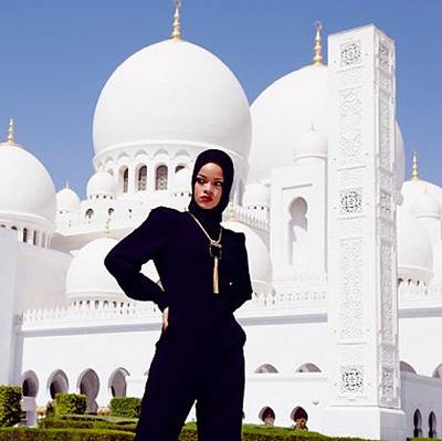 Uh Oh in Abu Dhabi - Over the weekend, Rihanna went to Abu Dhabi after a successful run in South Africa and before performing she visited a mosque and had an impromtu photoshoot in all black, including a hijab which is traditional attire that Muslim women wear. Due to her photo ops, she was asked by mosque officials to leave since they go against the &quot;sacredness&quot; of the mosque. She has yet to respond.   (Photo: Instagram via Rihanna)