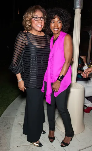 Simply Fabulous - The incomparable Diahann Carroll and Angela Bassett pose for a picture at the House of Flowers Dinner honoring Diahann Carroll and Cheryl Boone Isaacs at Tracey Edmonds' house in Beverly Hills. (Photo: Valerie Macon/Getty Images)
