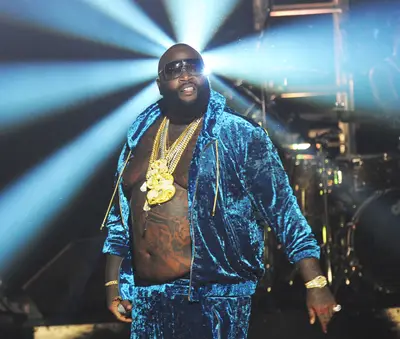 &quot;Drug Dealer's Dream&quot; - The wealth talk continues here, as an automated bank-teller voice tells Ross his account balance is more than $92 million before the rapper puffs out his chest and kicks that range from recalling his days &quot;eatin' out of the trash&quot; to shouting out a few strip clubs.&nbsp;(Photo: Chris McKay/WireImage/Getty Images)