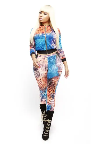 Kaleidoscope Dream - This vibrant two-piece is so Nicki Mianj. Unzip the jacket and layer a tank underneath or nix it altogether and pile a crisp chambray shirt over these colorful marbled leggings.&nbsp; (Photo: Courtesy of the Nicki Minaj Collection for Kmart and ShopYourWay.com)