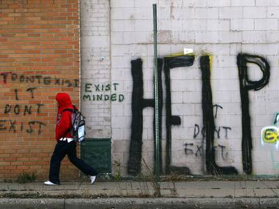 /content/dam/betcom/images/2013/10/Politics/101613-politics-government-shutdown-city-grafitti-poverty-urban-streets.jpg