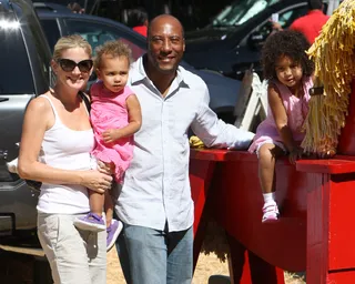 One Happy Family - TV producer Byron Allen and his family are all smiles as they make their way around Mr. Bones Pumpkin Patch.  (Photo: Mike / Splash News)