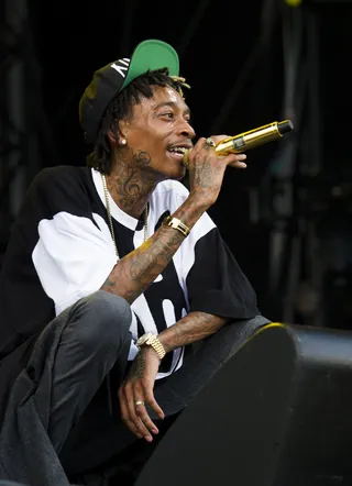 Close to Home - Wiz Khalifa, who hails from Pennsylvania, performs on day two of the 2013 Budweiser &quot;Made in America&quot; festival in Philadelphia. (Photo: Charles Sykes/Invision/AP)