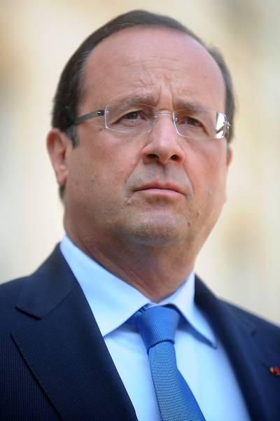 French President Francois Hollande - &quot;Mandela's&nbsp;message will not disappear. It will continue to inspire those fighting for freedom and to give confidence to people defending just causes and universal rights,&quot; said French President Francois Hollande, who is hosting dozens of African leaders this week for a summit on peace and security.&nbsp;&nbsp;(Photo: Antoine Antoniol/Getty Images)