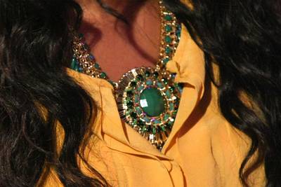 Jewel Tones - Angela Simmons' necklace glimmers in the light. (Photo: Bennett Raglin/BET/Getty Images for BET)