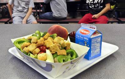 School Lunches - The bill provides $21 billion for mandatory funding for school lunch programs and child nutrition programs. It also gives schools more power to decide about how to include whole grain items on menus. (Photo: Hans Pennink, File/AP Photo)