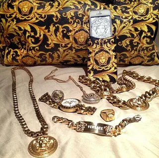 Game  - The rapper has a love affair with Versace chains and diamonds.  (Photo: Instagram via The Game)