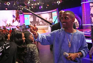 Detroit Red - Big Sean gives a charming smile on 106. (Photo: Bennett Raglin/BET/Getty Images for BET)