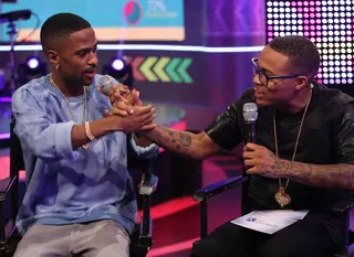 Showing Love - Big Sean and Bow Wow dap up on 106. (Photo: Bennett Raglin/BET/Getty Images for BET)