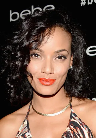 Selita Ebanks - Selita brightens up her beauty routine with this creamy coral lip and cute curly ‘do.&nbsp;   (Photo: Theo Wargo/Getty Images for bebe)