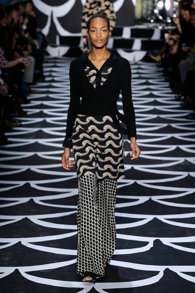 Diane von Furstenberg - This year, DVF marks the 40th anniversary of her iconic wrap dress. She rings in the milestone with rich, gold accents and the flattering shapes we’ve come to love, like this 70’s-inspired tunic and trousers set modeled by the gorgeous Jourdan Dunn.(Photo: Neilson Barnard/Getty Images for Mercedes-Benz Fashion Week)