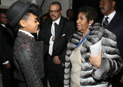 Humbled - In this candid photo you can see how happy, humbled and excited Janelle Monae is to be speaking with the legendary Aretha Franklin backstage.(Photo: Bennett Raglin/BET/Getty Images for BET)