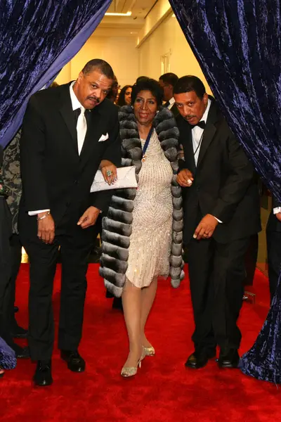 A Path Way for Royalty&nbsp; - Aretha Franklin is escorted to her front-row seat inside of the Warner Theater, ahead of being honored by Karen Clark-Sheard, Jennifer Hudson and more.&nbsp;(Photo: Bennett Raglin/BET/Getty Images for BET)